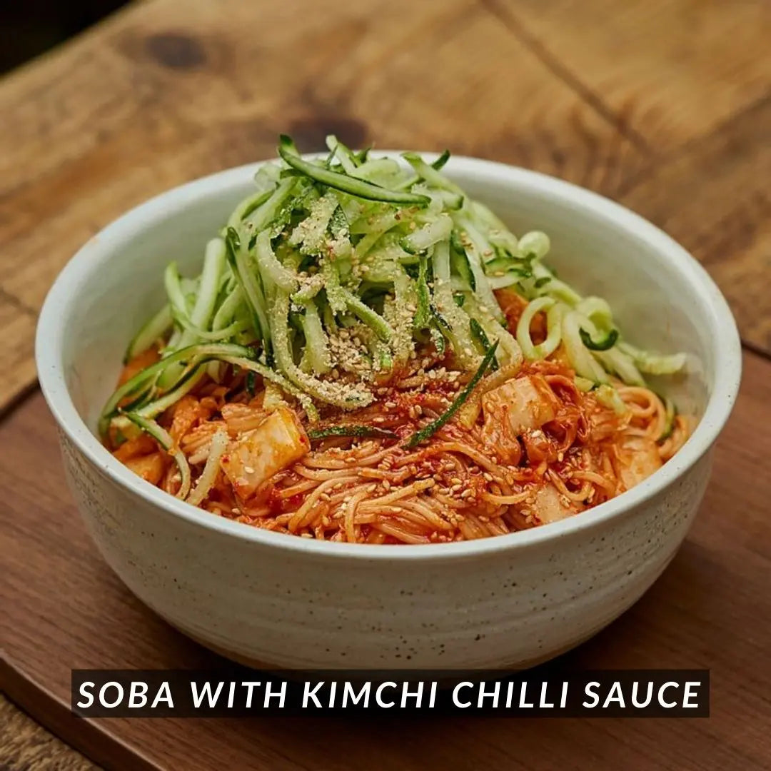 Spicy kimchi noodles topped with cucumber