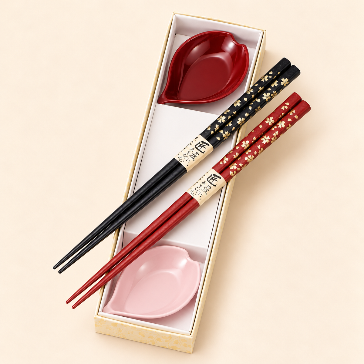 Japanese couple chopsticks gift set: black and red pairs with gold cherry blossom and two petal sauce bowls in a box